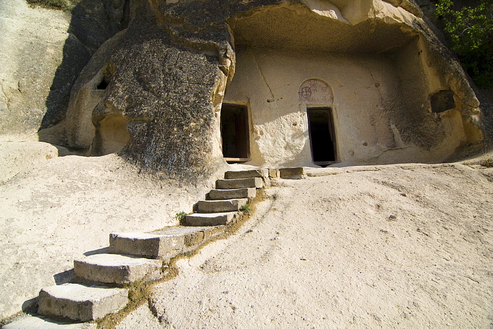 Entrance to a rock church in the open air museum, UNESCO World Heritage Site, Goreme, Cappadocia, central Anatolia, Turkey, Asia