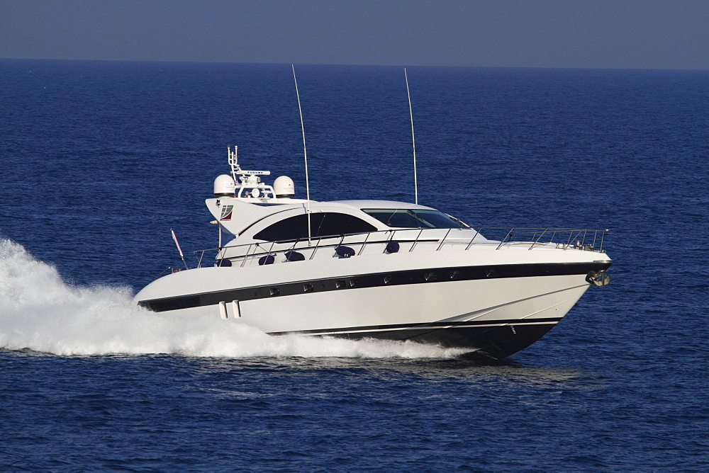 Motor boat at full speed off Monaco, Europe