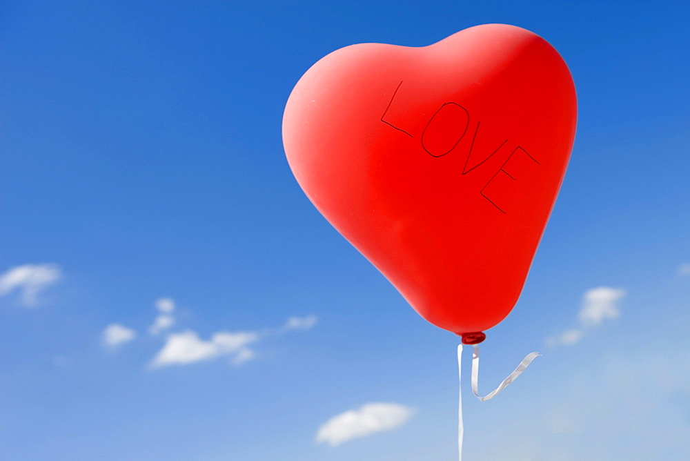 Red heart-shaped balloon, love