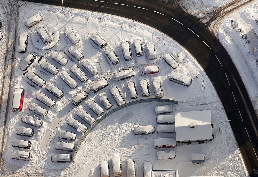 Aerial view, car dealer, corner of Jahnstrasse street and Warsteiner Strasse street, snow, Meschede, North Rhine-Westphalia, Germany, Europe