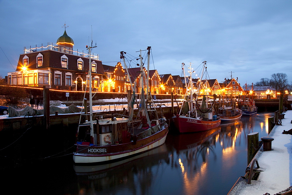 Illuminated harbour area, North Sea resort of Neuharlingersiel, North Sea, East Frisia, Lower Saxony, Germany, Europe