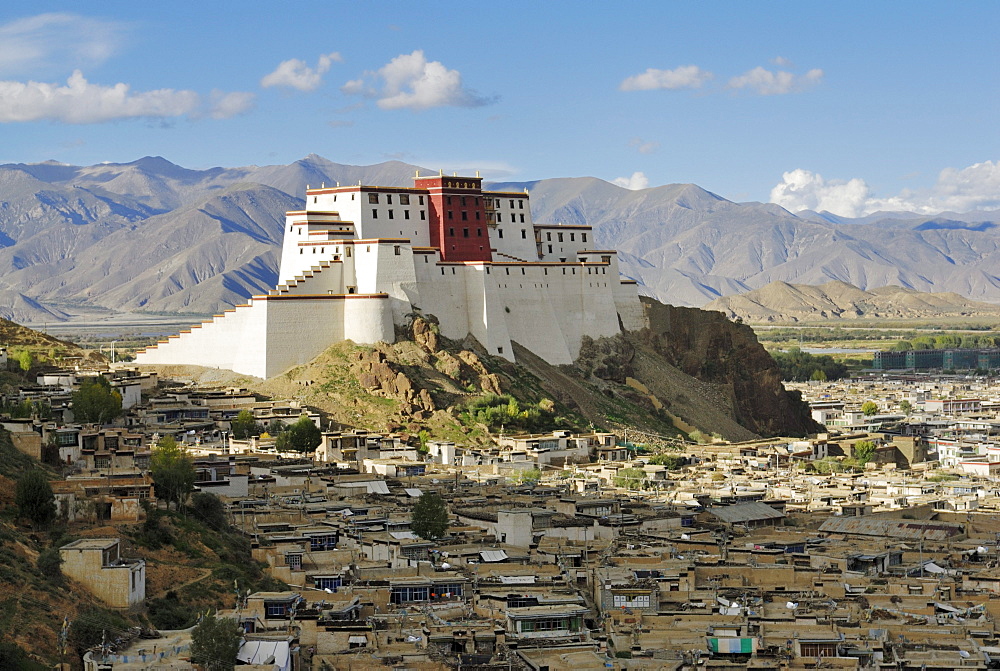 View over the historic town centre and the rebuilt Shigatse Dzong fortress, Shigatse, Tibet, China, Asia