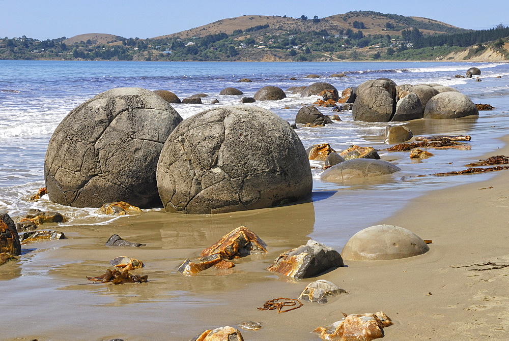 Rocks on a sandy beach, Moeraki Boulders, a geological rock formation, Moeraki, East Coast, South Island, New Zealand