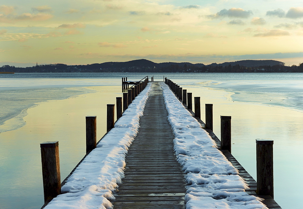 Jetty at sunrise on Lake Woerth in winter, Upper Bavaria, Bavaria, Germany, Europe