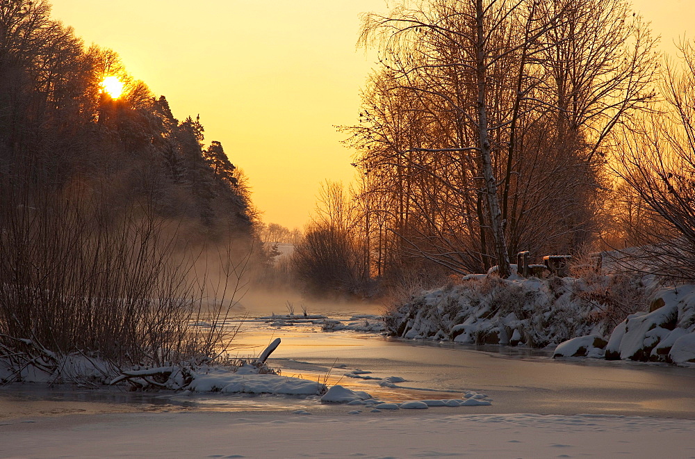 Winter morning on a frozen river with a bench at sunrise, Feistritz near Herberstein, Styria, Austria, Europe