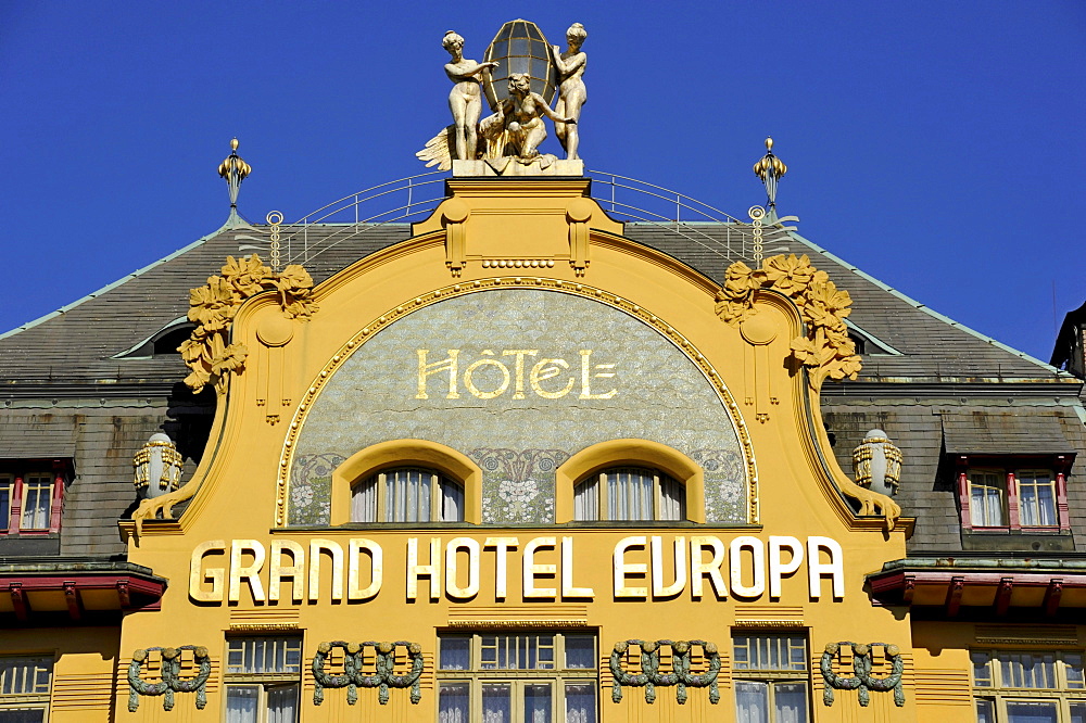 Art Nouveau statues on the gable of the Grand Hotel Europa, Wenceslas Square, Prague, Bohemia, Czech Republic, Europe