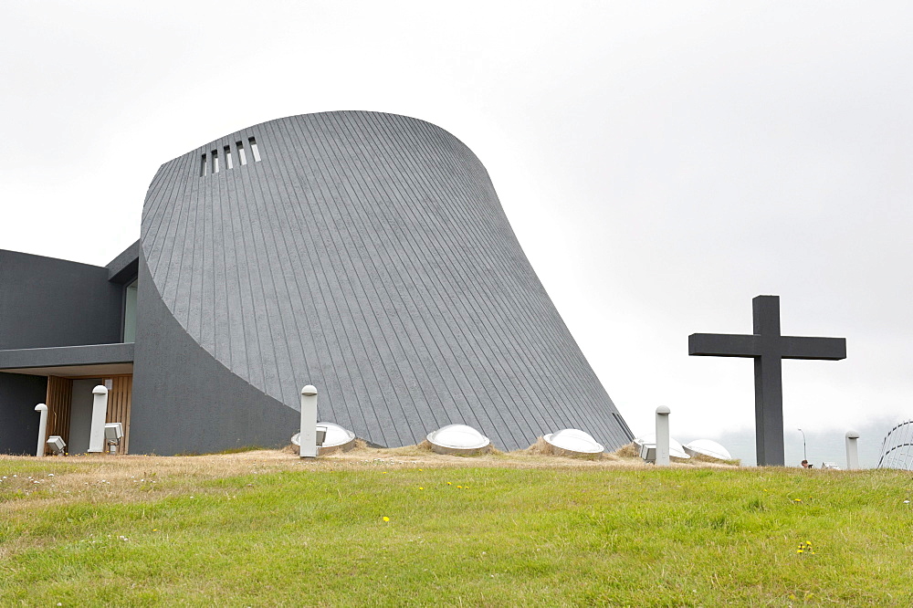 Modern church, concrete construction, with a large cross, new parish church, Bloenduos, Blonduos, Iceland, Scandinavia, Northern Europe, Europe