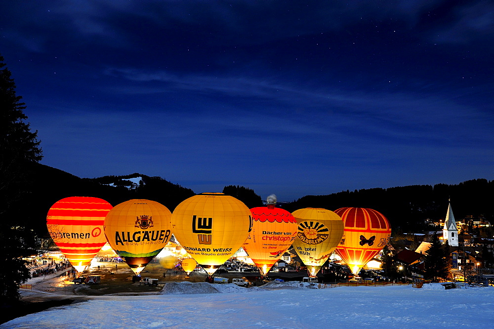 Tethered hot-air balloons at the blue hour, Jungholz, Tyrol, Austria, Europe