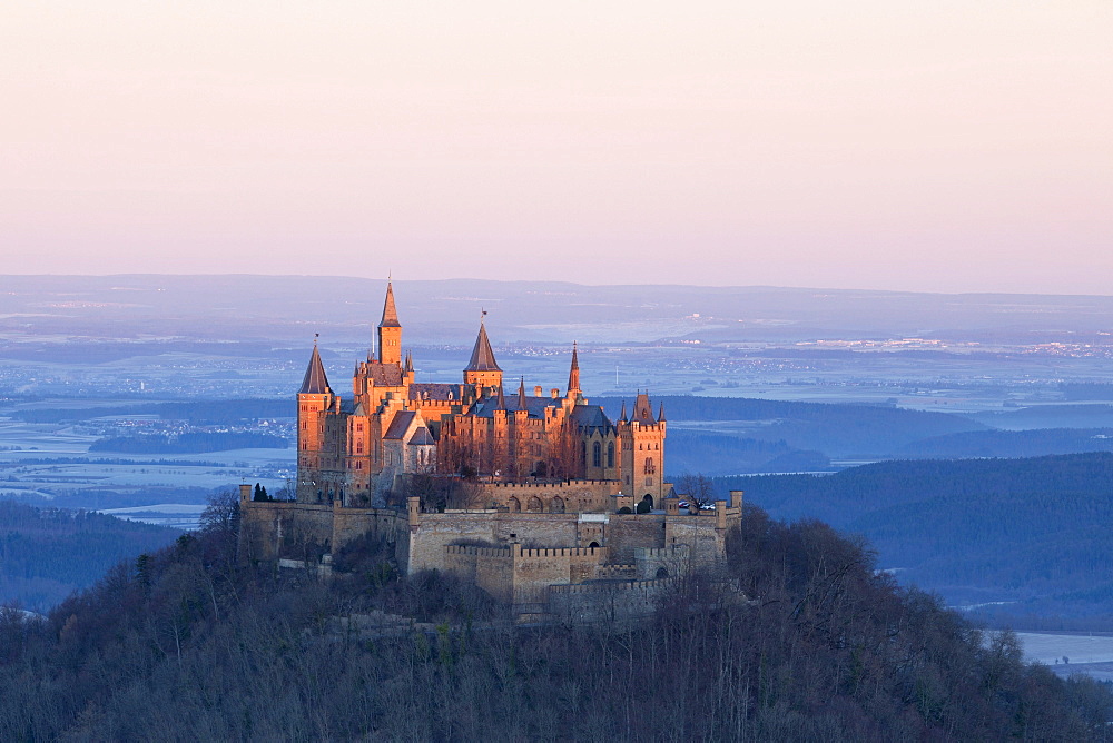 Early morning at the Burg Hohenzollern castle from the Zeller Horn, Swabian Alb near Hechingen, Baden-Wuerttemberg, Germany, Europe