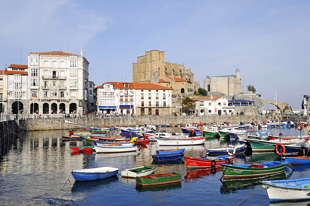 Small boats in a harbour, Santa Maria Church, Santa Ana Fortress, Castro Urdiales, Gulf of Biscay, Cantabria, Spain, Europe