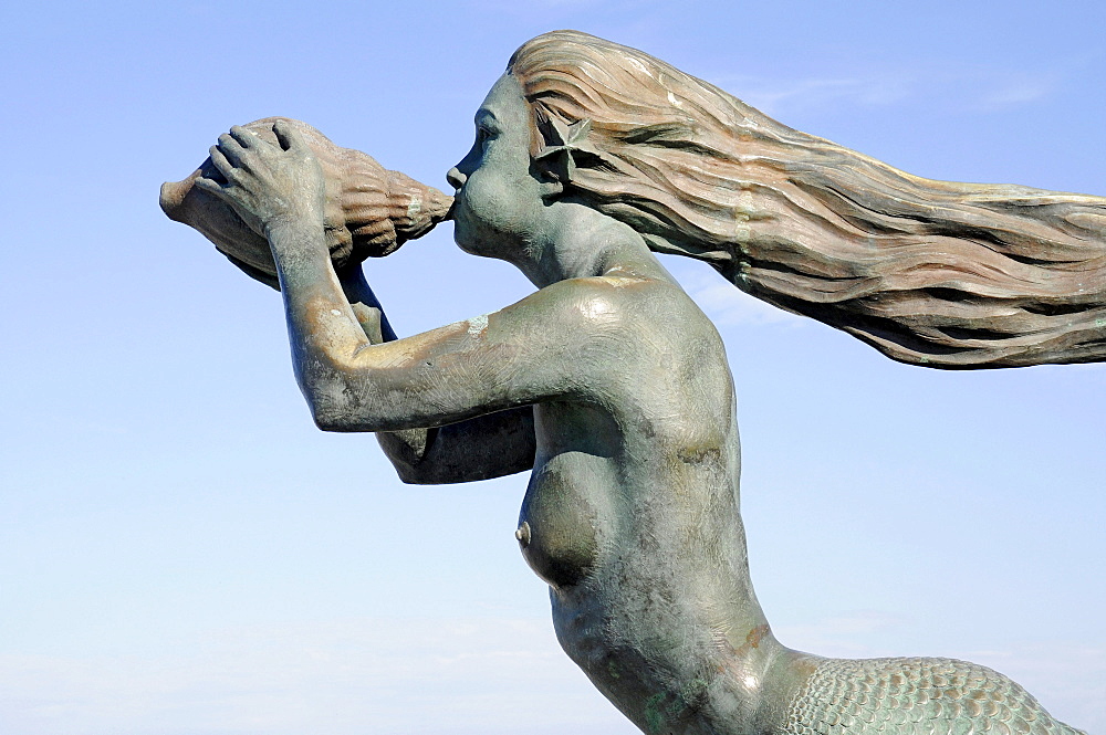 Sculpture of a mermaid blowing a chonch shell, La Magdalena peninsula, Santander, Cantabria, Spain, Europe