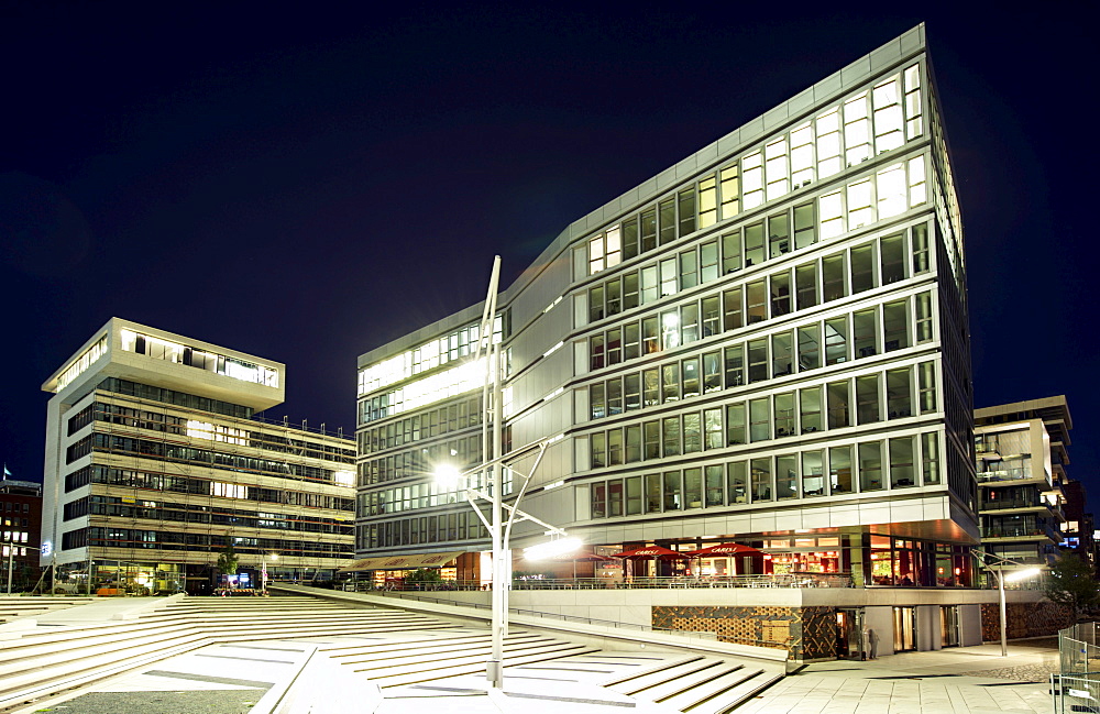 Johannes-Dalmann-Haus building and Am Kaiserkai street in the Hafencity district in Hamburg in the evening, Germany, Europe