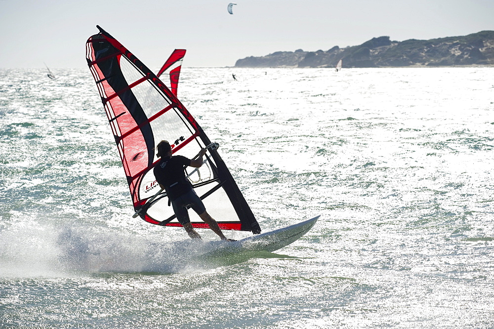 Wind surfers and kite surfers surfing near Tarifa, Costa del Luz, Andalucia, Spain, Europe