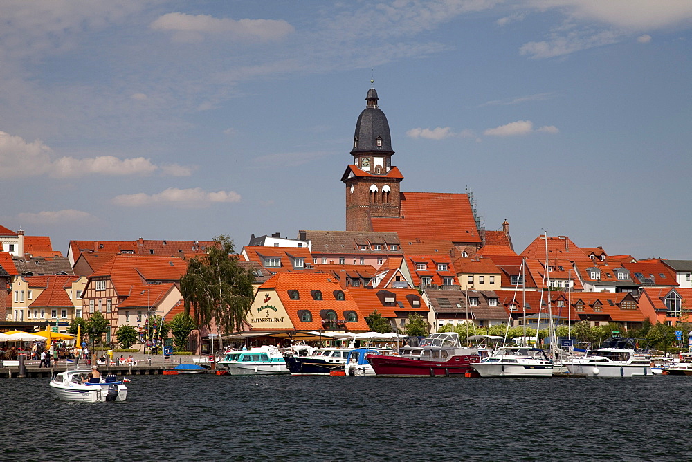 St. Mary's Church and the port of the climatic health-resort of Waren on Lake Mueritz, Mecklenburg Lake District, Mecklenburg-Western Pomerania, Germany, Europe