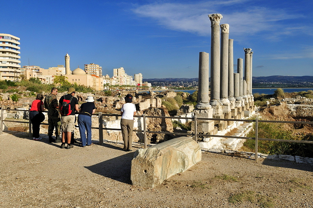 Tourists in the ancient archeological site of Tyros, Tyre, Sour, Unesco World Heritage Site, Lebanon, Middle east, West Asia