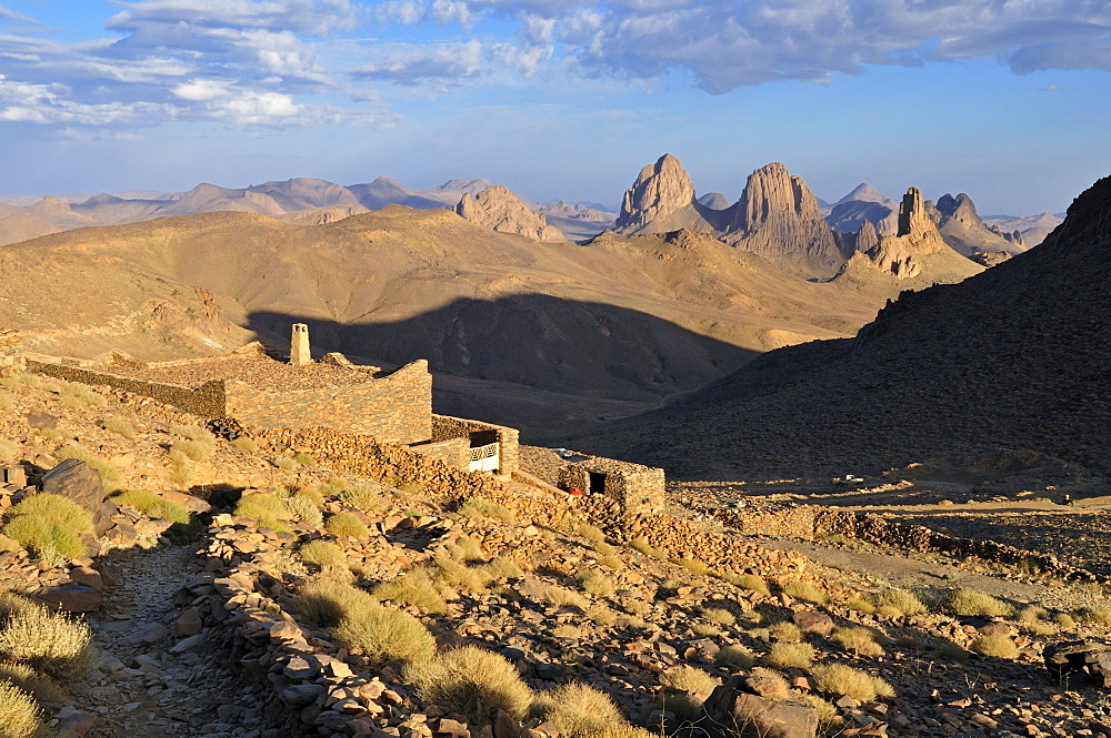 Building on Assekrem with view over the volcanic landscape of Atakor, Hoggar, Ahaggar Mountains, Wilaya Tamanrasset, Algeria, Sahara, North Africa