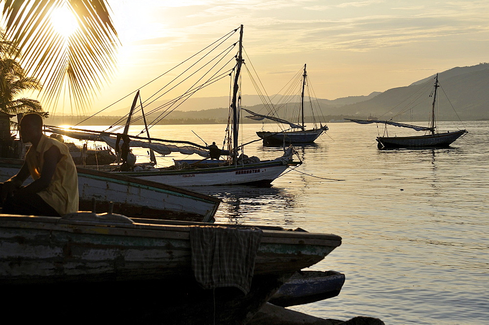 Fishing boats at sunset, fishing village on the Caribbean coast, Petit Goave, Haiti, Caribbean, Central America