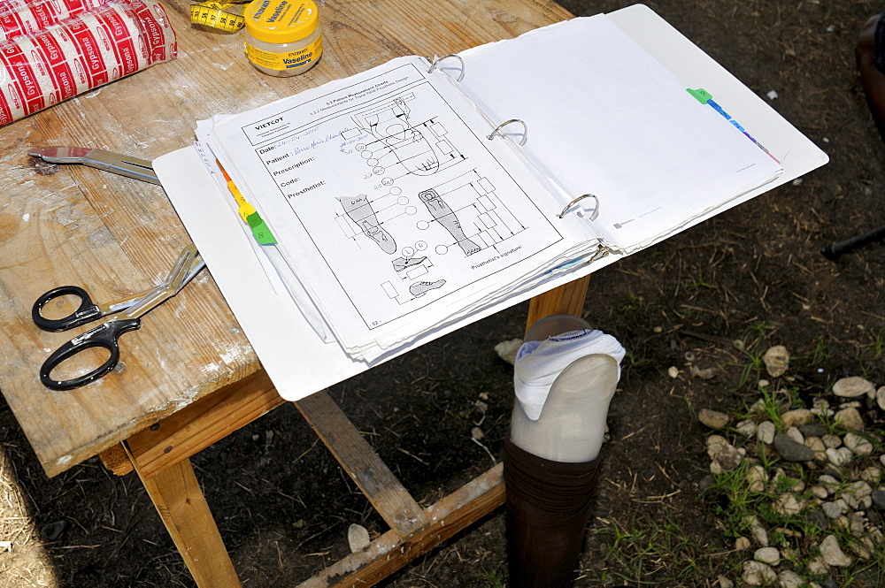 Fitting of an artificial limb for a young woman who lost her leg in an earthquake, emergency relief programme of a relief organisation following the January 2010 earthquake, Leogane, Haiti, Caribbean, Central America