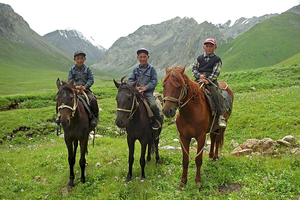 Young horsemen. Akkol Canyon, Kazakhstan.