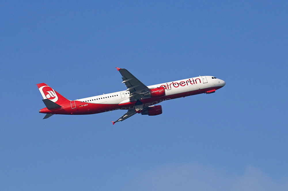 Airbus A321 of airline Airberlin after take-off with landing gear doors closing