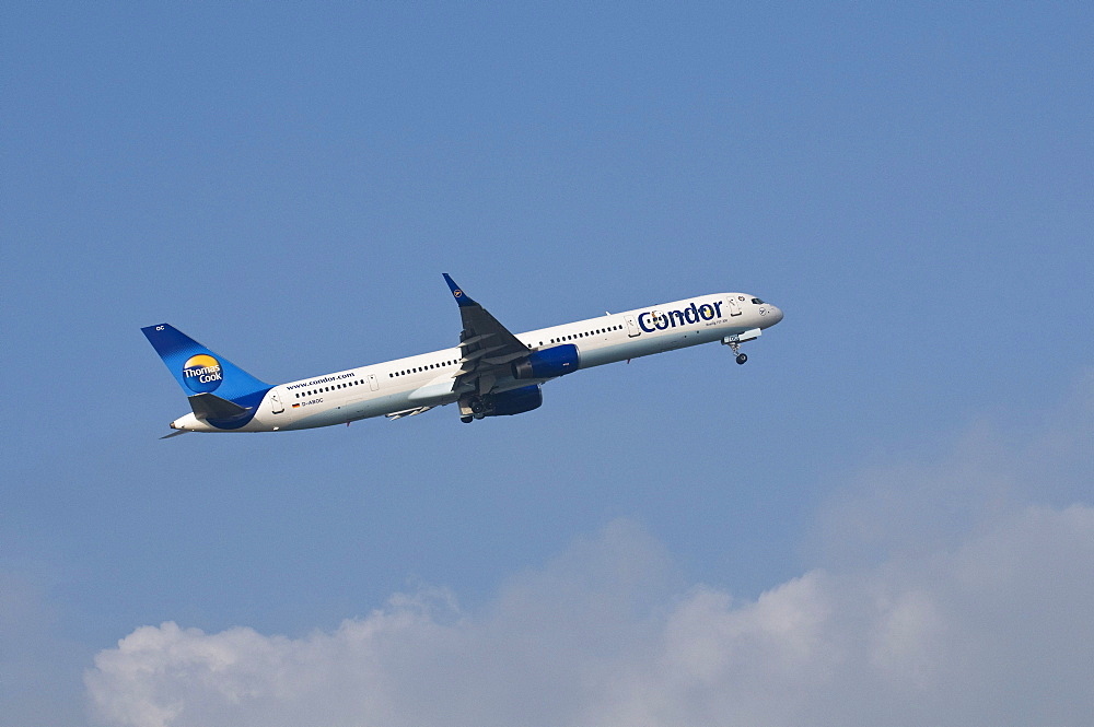 Aircraft of Thomas Cook airline, Condor airline, during take-off, Boeing 757-300 WL, with Peanuts-comic characters Snoopy and Woodstock painted on aircraft