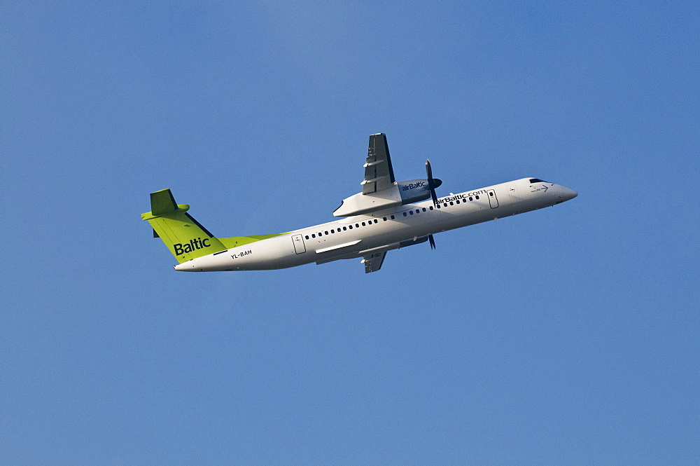 Baltic Air De Havilland Canada, propeller aircraft climbing