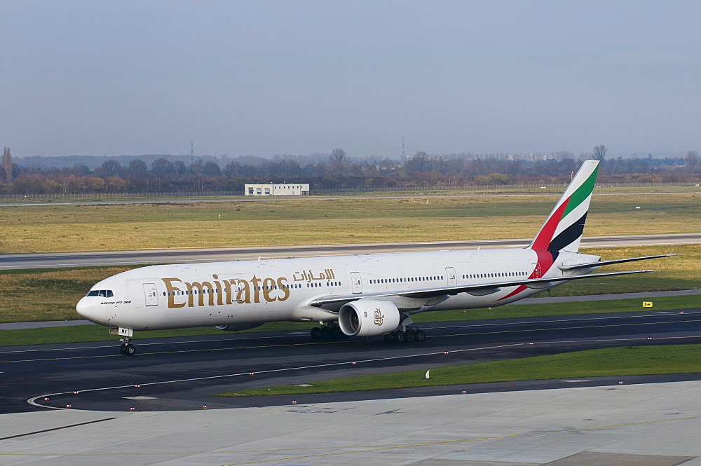 Emirates Boeing 777-300 on the runway, Dusseldorf International Airport, North Rhine-Westphalia, Germany, Europe