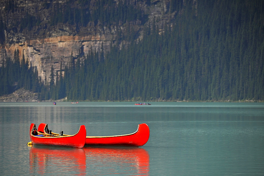 Historic Native American canoes, Lake Louise, Banff National Park, Canadian Rocky Mountains, Alberta, Canada