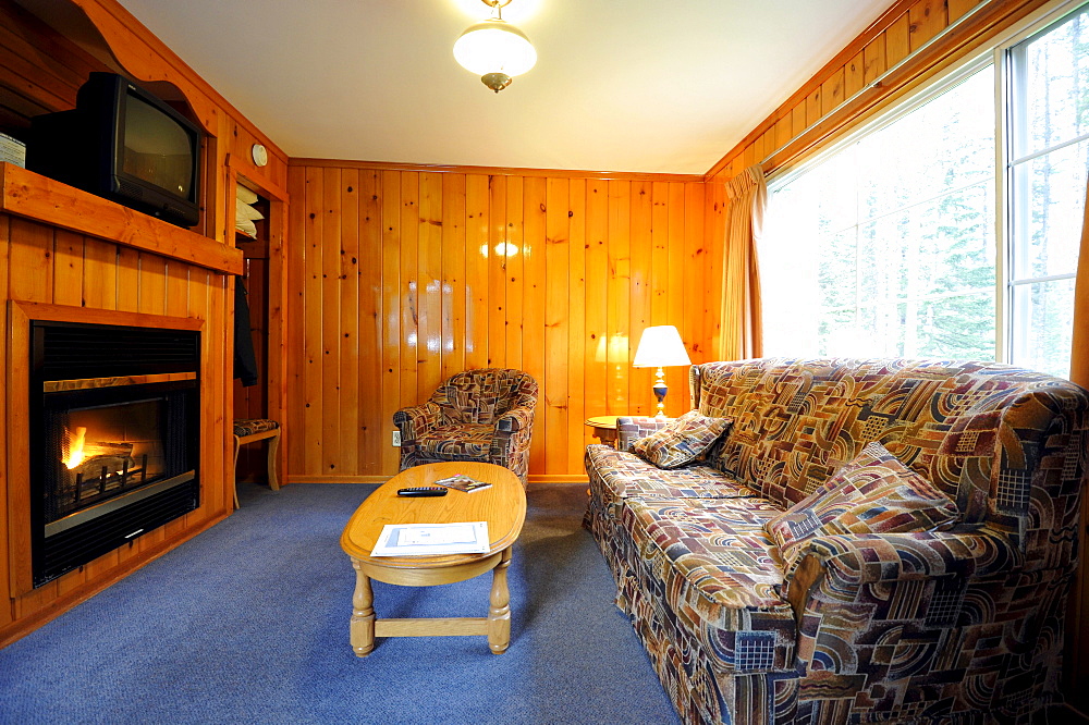 Interior view, living area, log cabin Becker Chalets, Jasper National Park, Canadian Rockies, Rocky Mountains, Alberta, Canada