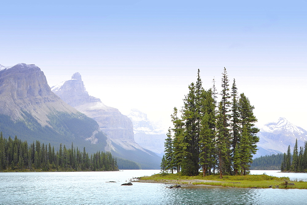 Spirit Island in the early morning, Maligne Lake with Mount Paul, Monkhead and Mount Warren in the back, Maligne Valley, Jasper National Park, Canadian Rocky Mountains, Alberta, Canada