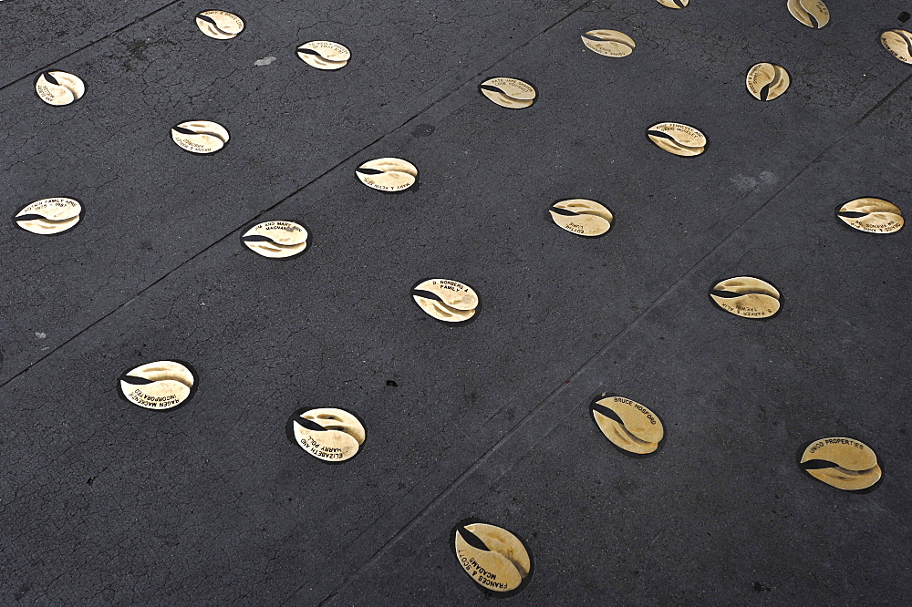 Sponsors names immortalized in bronze hoofprints of Rachel, the unofficial mascot, a lucky pig made of bronze, at the entrance of Pike Place Public Market, Seattle, Washington, USA