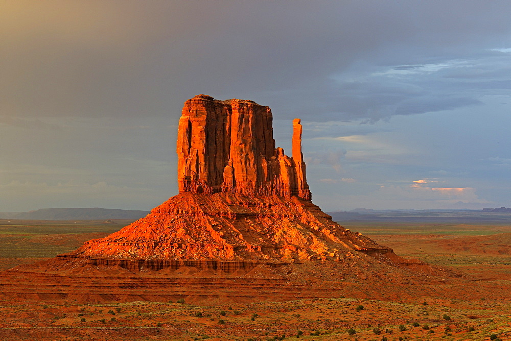 West Buttes in the last light during a storm, Monument Valley, Arizona, USA