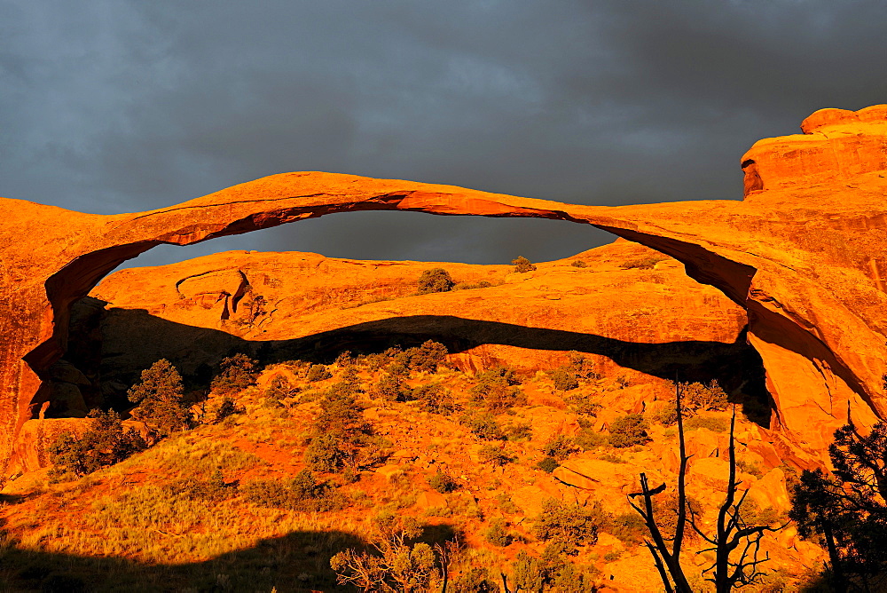 Landscape Arch rock formation in the morning in a stormy atmosphere, Arches National Park, Utah, United States, America