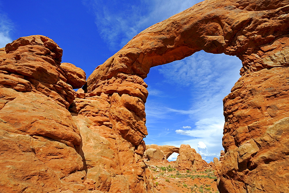 Looking through the "Turret Arch", "South Window" at back, Arches National Park, Utah, USA