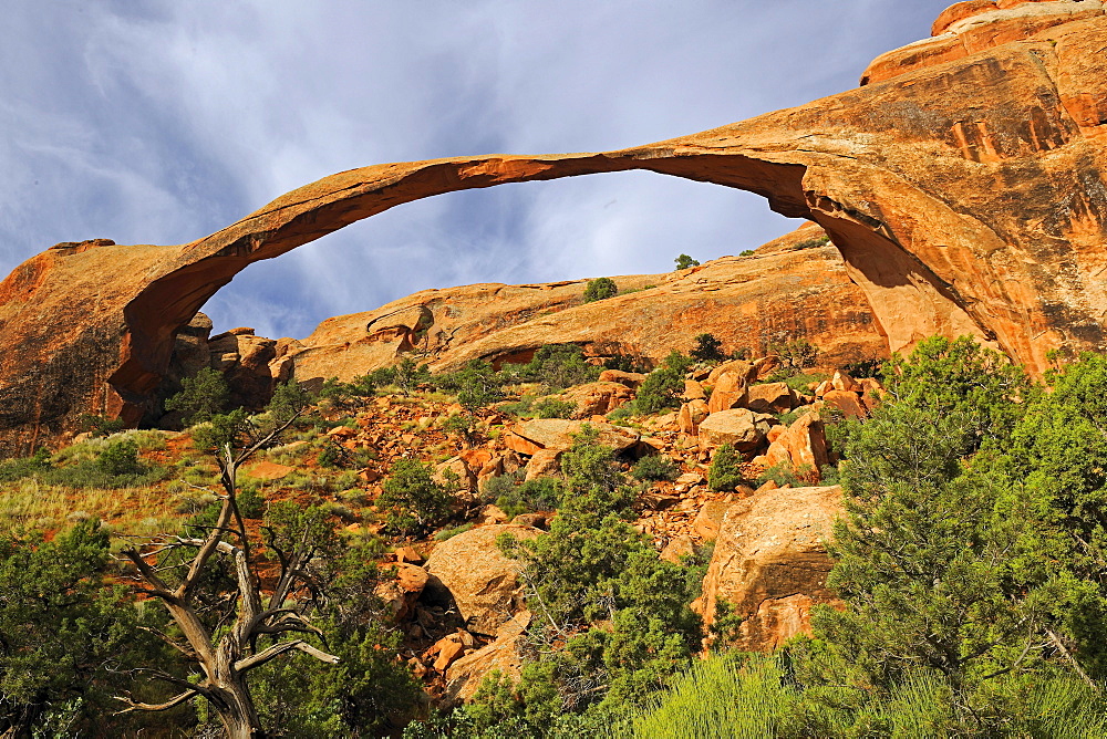 Landscape Arch at sunrise and approaching thunderstorm, Arches National Park, Utah, USA