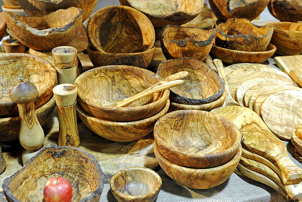 Various kitchen utensils made of olive wood