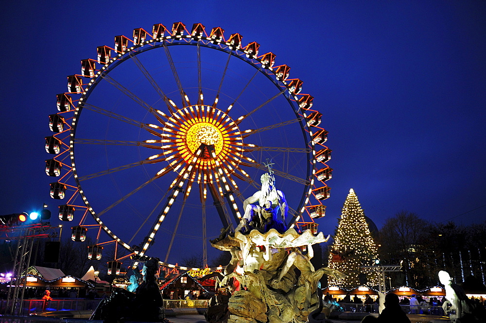 Christmas market with a ferris wheel at the Neptune Fountain, Alexanderplatz, Berlin, Germany, Europe