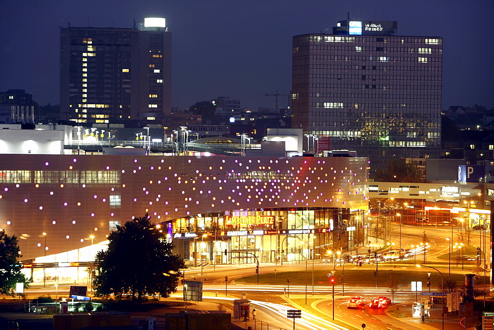 Skyline of Essen and Limbecker Platz shopping center, completed in 2009, Essen city centre, illuminated facade on Berliner Platz square, Essen, North Rhine-Westphalia, Germany, Europe