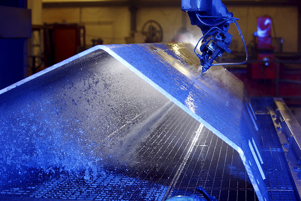 Water jet technology, precise technology for cutting metal with a high pressure water jet, where an abrasive material is added to the water, Waterjet company, Aarwangen, Switzerland, Europe