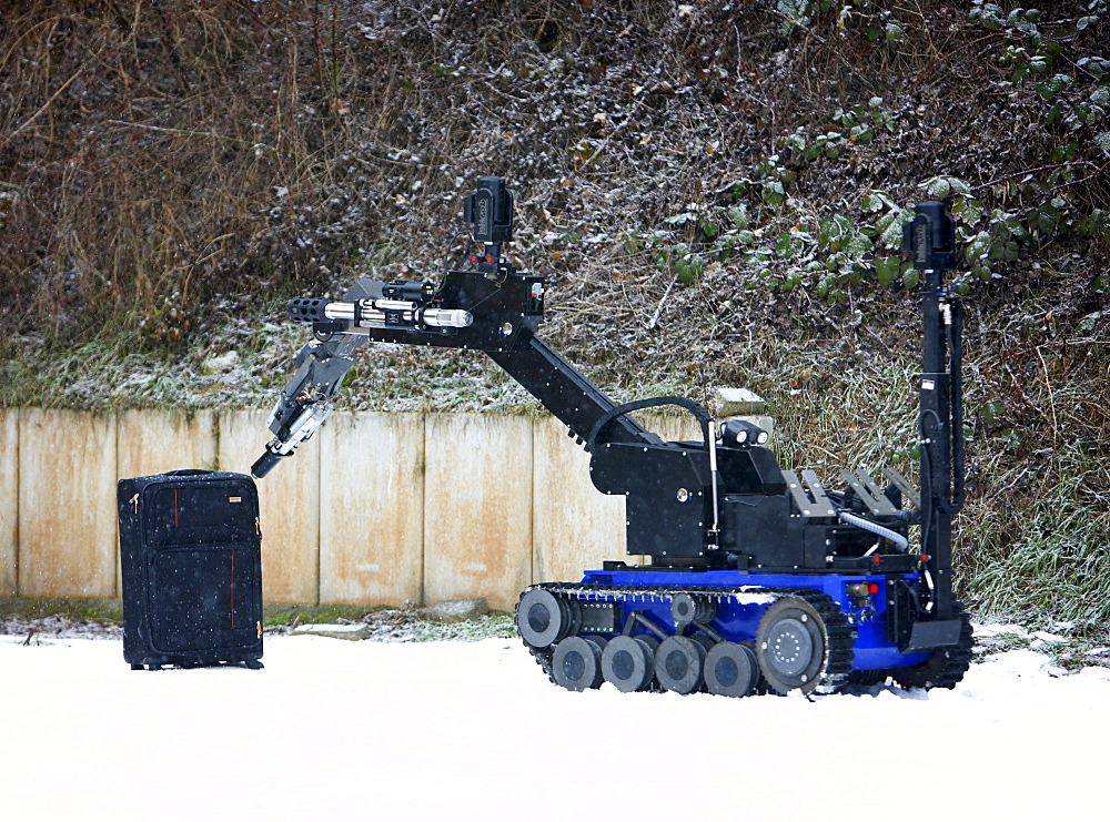 Radio control robot from the Telerob company to defuse explosives, bombs and other dangerous devices by remote control, the water gun uses extreme high pressure to render the explosive device unusable