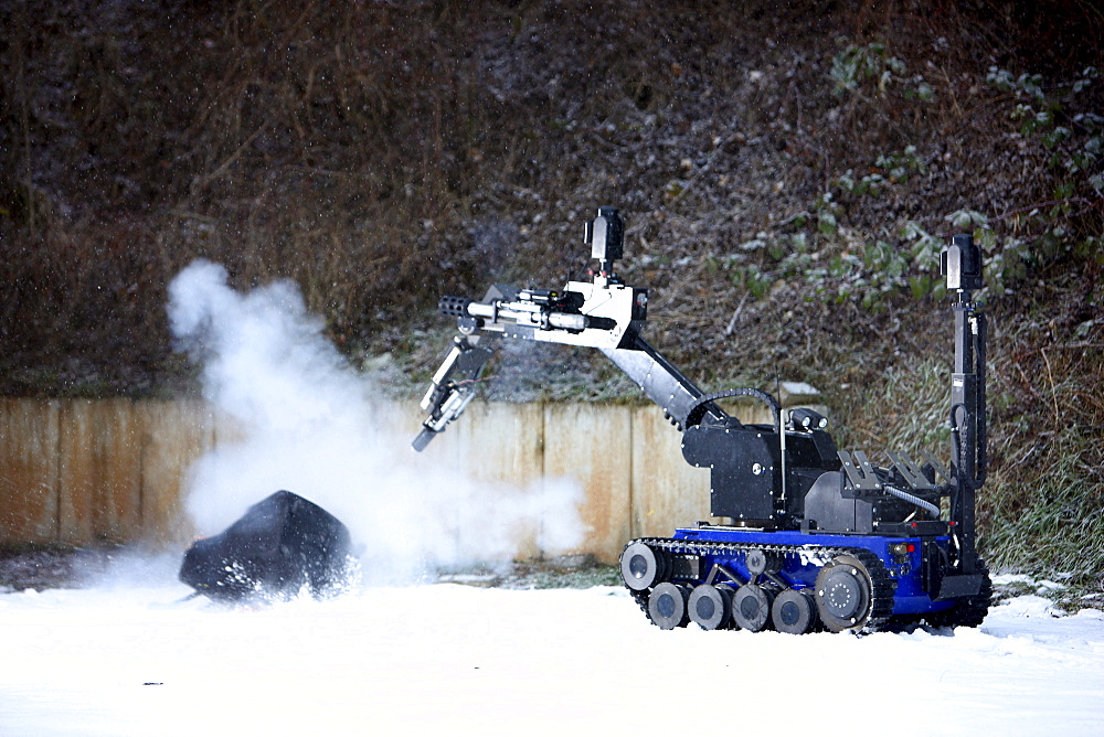 Radio control robot from the Telerob company to defuse explosives, bombs and other dangerous devices by remote control, the water gun uses extreme high pressure to render the explosive device unusable