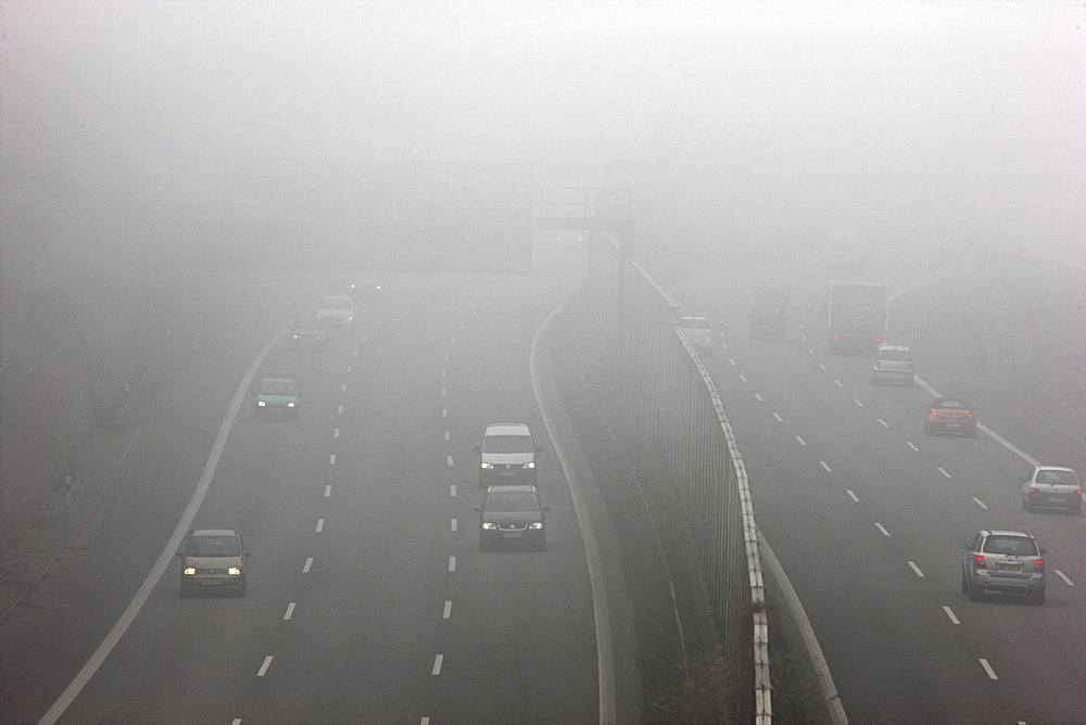 A52 motorway in thick fog, autumn, visibility below 100 metres, Essen, North Rhine-Westphalia, Germany, Europe