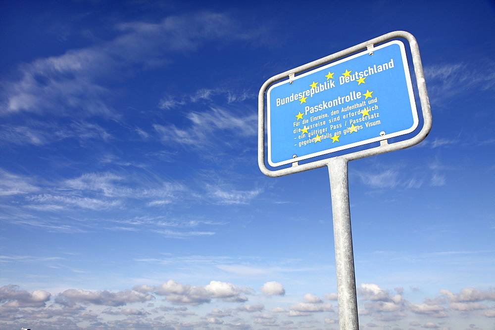 German border sign in the port of Spiekeroog island, one of the East Frisian Islands in the North Sea, lettering "Passkontrolle", German for "passport control", announcing visa requirement, Lower Saxony, Germany, Europe