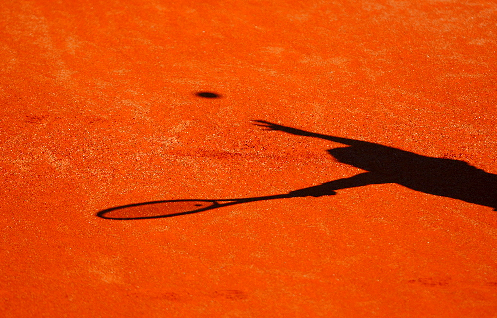 Shadow of a tennis player