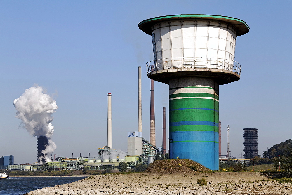 Tower of a pumping station on the Rhine, coking plant and blast furnace plant Schwelgern, ThyssenKrupp Steel, factory in Bruckhausen, Duisburg, North Rhine-Westphalia, Germany, Europe