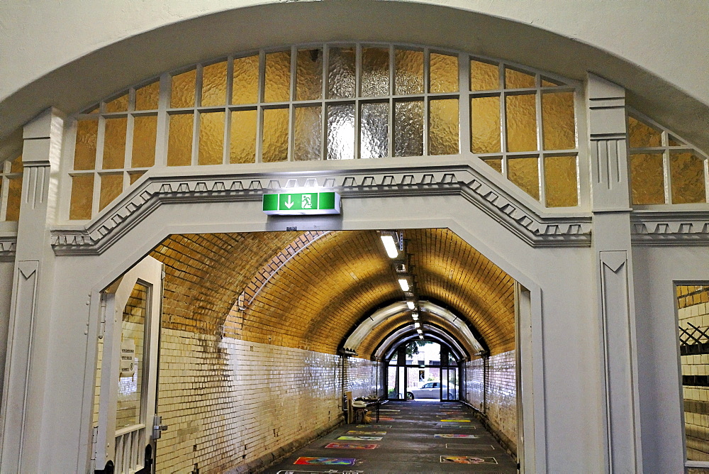 Disused Suedbahnhof railway station, built in 1908, exit leading through a tunnel, restored, Krefeld, North Rhine-Westphalia, Germany, Europe