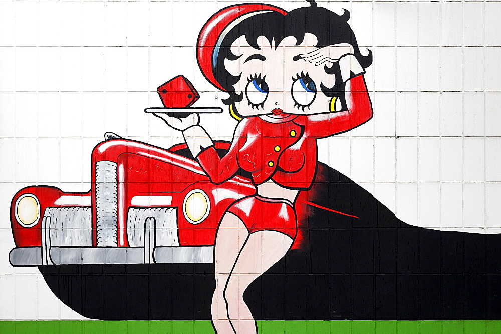 Waitress with a trusty look, comic-style advertising character painted on the wall, drive-in restaurant, Krefeld, North Rhine-Westphalia, Germany, Europe