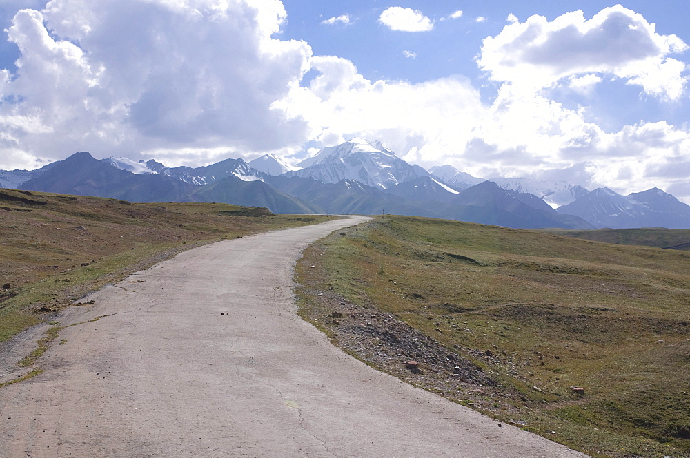 Highway leading into the mountains near Sary Tash, Kyrgyzstan, Central Asia