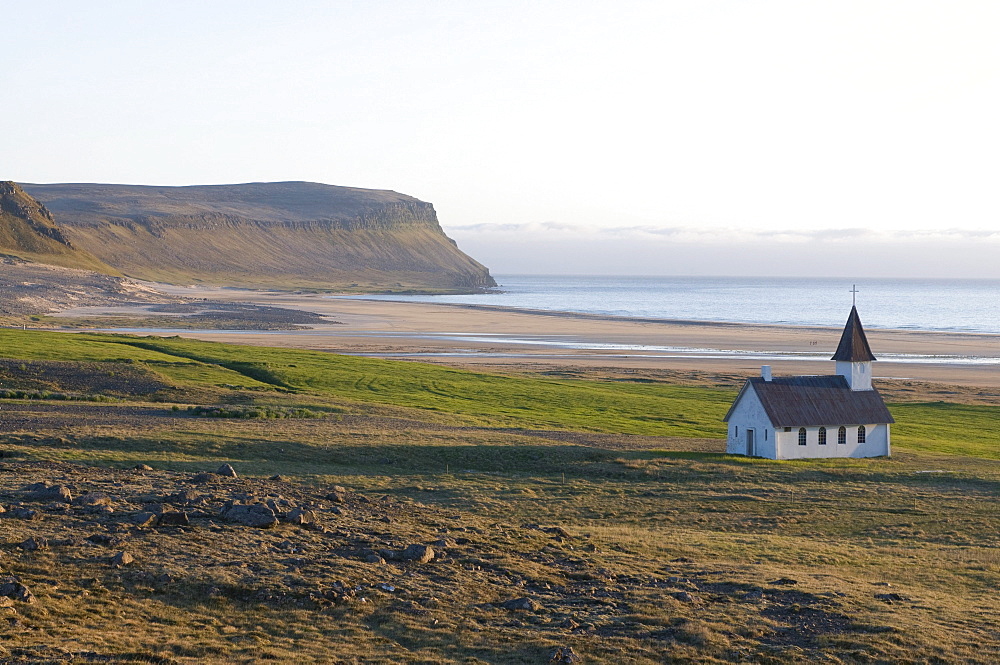 Kittel chapel in the bare landscape at turquoise coast, Westfjords, Breidavik, Iceland, Europe