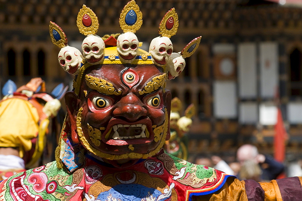 Masked man at the religious festival of Tsechu, Paro district, Bhutan, Asia